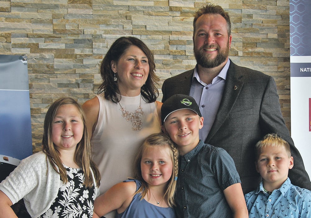 Jennifer and Jordan Lindgren from Norquay. Sask., pose with their children, Alexis, left, Bristol, Jaxson and Westin, after being named the 2018 Saskatchewan Outstanding Young Farmers.  |  Karen Briere photo