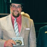 Ryan Konynenbelt, 21, of Nobleford, Alta., is the youngest to be named the international livestock auctioneer champion at the Calgary Stampede. | Barbara Duckworth photo