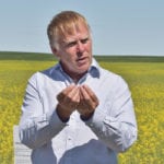 Scott Meers, an insect specialist with Alberta Agriculture, told a canola crop walk last week that farmers need to make sure to do enough sweeps when scouting for insects so that they can make proper spraying decisions. | Barb Glen photo