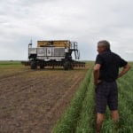 Norbert Beaujot, founder of SeedHawk and inventor of many seeding equipment innovations, observes the Seedmaster DOT, an autonomous seeding unit that is one of his latest inventions. He and the DOT were at last week’s Ag in Motion show. | Barb Glen photo