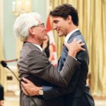 Prime Minister Justin Trudeau congratulates Jim Carr after he was sworn in as International Trade Diversification Minister last week. Carr will continue the efforts of previous governments to reduce Canada’s on exports to the United States. | REUTERS/Chris Wattie photo