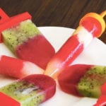 The round popsicles are started with a layer of apple juice before blended strawberries and blended bananas are added. They are finished with blended strawberries. The rectangular popsicles are blended strawberries and then a blended kiwi layer. | Leanne Deobald photo