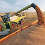 A French farmer harvests wheat near Bourlon, in northern France. Drought has seen French producers with yields that are half of last year’s in many places. | REUTERS/Pascal Rossignol photo