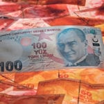 The most likely impact of the Turkish lira crisis is that the Canadian dollar might slip a couple of pennies against the American dollar in the next few weeks if the crisis continues or spreads. | REUTERS/Murad Sezer illustration