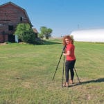 Sydney Hampshire takes a photo of a barn for her book project, Heritage Barns of Flagstaff: Volume 1. | Photo submitted by Sydney Hampshire