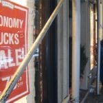 A sign hangs in a window at Fishs Eddy store in New York Dec. 24, 2008. The global recession manifested itself in big and small ways, most gloomy, some quirky and often reflecting the inventive human spirit. A series of Hedge Row columns will look at the lessons Canadian farmers can learn from the crisis. | REUTERS/Michelle Nichols photo