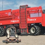 If Rubicon failed to satisfy your lust for big iron, the six-wheel drive Hexx Traxx 12-row one-pass beet harvester tops the beets, digs them, cleans them and conveys them up into the 30 ton hopper. | Ron Lyseng photo