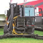 Manure vacuums like the Mensch can free producers from tying their barns to their manure processing. A roots-type blower pulls in large volumes of material that is gathered by giant squeegees that ride on the barn floor. | Michael Raine photo