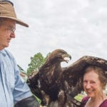 Colin Weir gives Arlene Karpan a close-up view of a golden eagle at the Alberta Birds of Prey Centre in Coaldale, Alta. | Robin and Arlene Karpan photo