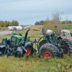 A tractor crossing the highway near Westlock, Alta., was hit by a truck carrying propane. | Les Dunford photos