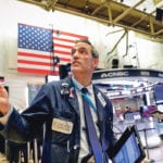 Traders work on the floor of the New York Stock Exchange Oct. 24. It’s too early to know if the recent drop in the stock market will boost farm commodities, but the U.S.-China trade war is dragging all sectors down. | REUTERS/Brendan McDermid photo