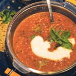 Dal, a traditional thick vegetarian spiced stew, is served with yogurt and mint with rice or flatbread. It’s typically made with red lentils. | Michael Raine photo