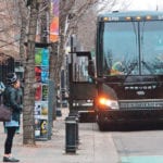 A Red Arrow bus prepares to depart from downtown Edmonton. | Jeremy Simes photo