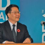 Canadian Foodgrains Bank chair Ken Kim talks about the organization’s second year of partnership with Viterra during an event at the company’s grain terminal south of Lethbridge Nov. 6. | Barb Glen photo