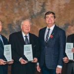 Alberta Agriculture Minister Oneil Carlier, third from left, stands with the latest inductees to the Alberta Agriculture Hall of Fame: Ronald Howard, left, Dietrich Kuhlmann and Garnet Altwasser. | Government of Alberta photo