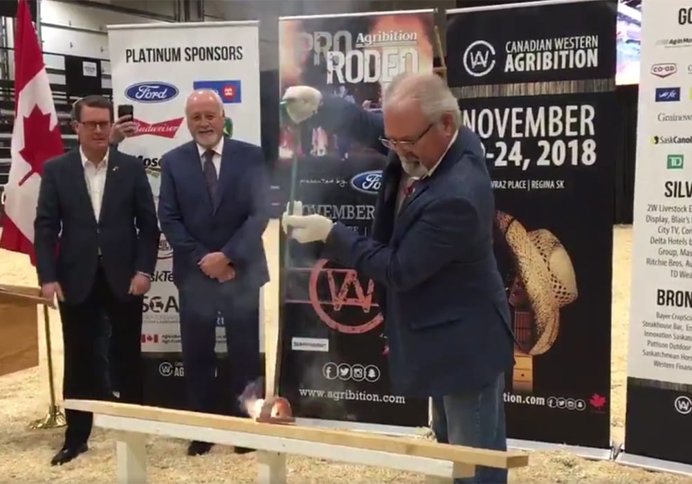 Former federal Agriculture Minister Gerry Ritz did the honours this year in recognition of his work to open markets for agricultural products and in securing funding to build the new International Trade Centre on the site. | Karen Briere photo