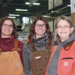 Mathilda Milligan, left, Valentina Gabert and their mother, Sharon Gabert, make up part of the Gabert family recognized for 50 years of consecutive membership in the Canadian Angus Association. Based at Fort Saskatchewan, Alta., the family has participated in every Farmfair International since it started 45 years ago. | Barbara Duckworth photo