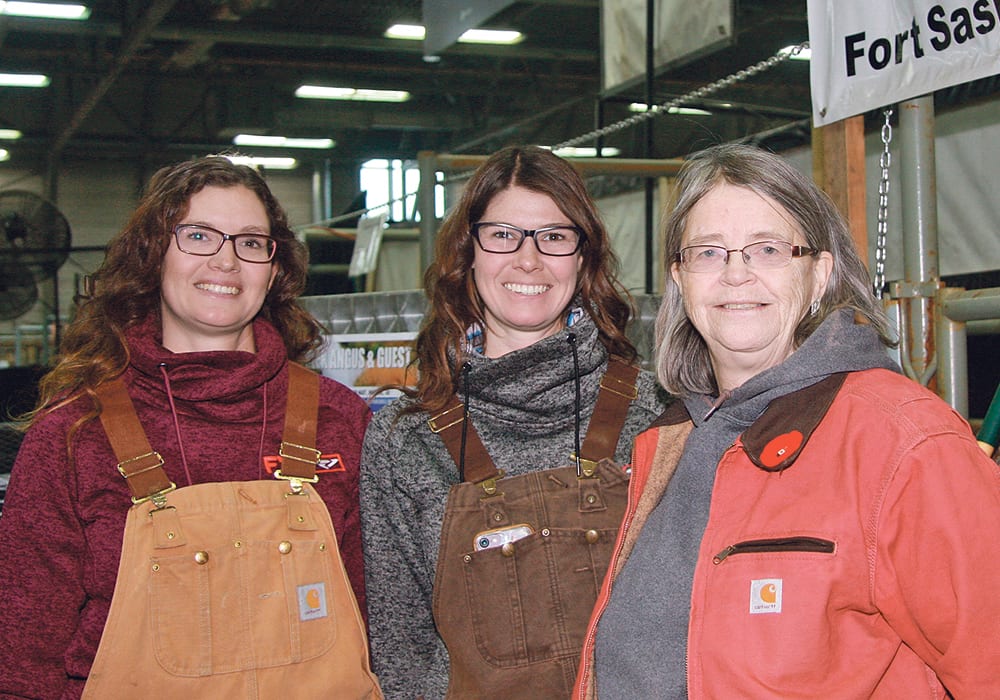Mathilda Milligan, left, Valentina Gabert and their mother, Sharon Gabert, make up part of the Gabert family recognized for 50 years of consecutive membership in the Canadian Angus Association. Based at Fort Saskatchewan, Alta., the family has participated in every Farmfair International since it started 45 years ago.  |  Barbara Duckworth photo
