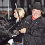 Craig Blair of Blairs.Ag Cattle Co. shows his happiness with the farm’s win for its female, PM Echo 8’16, at the RBC Beef Supreme Challenge. | Michael Raine photo
