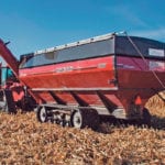 The new Haulmaster is 16 inches lower than previous models. It replaces the belt drive with a gearbox and has a new gentle hydraulic system for the auger fold/unfold. Although 95 percent of the carts sold by Elmer’s have the rubber track system, there has been surprisingly little interest in the hydraulic drive option. | Ron Lyseng photo
