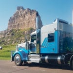 The trucking division of Somerville Farms Ltd. got its start hauling local grain in southwestern Saskatchewan but has since grown into a continental, long-haul transport company, moving goods throughout Canada and the United States. Unit 285, owned by Jordan Peters, is shown here during a run through Natrona County near Casper, Wyoming. | Photo courtesy of Somerville Farms Ltd.