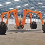 The 1.8 metre square spider-shaped robot folds up compactly and unfurls to provide farmers with a driverless drill. | Small Robot Company photo