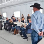 Brad Osadczuk, right, of Jenner, Alta., was one of several ranchers who saw their herds destroyed in an effort to contain a bovine tuberculosis outbreak in southeastern Alberta in 2016-17. Federal officials eventually killed 11,500 cattle, and the question of whether Canada still has the social licence to kill so many animals to find only six with the disease was asked recently at an Ottawa conference. | File photo