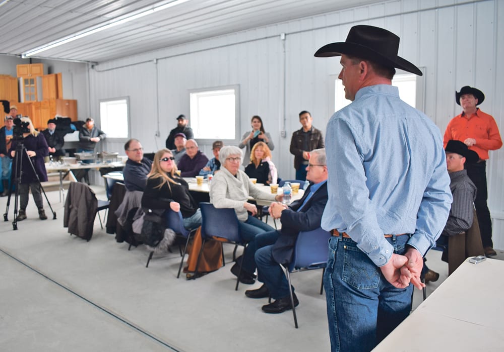 Brad Osadczuk, right, of Jenner, Alta., was one of several ranchers who saw their herds destroyed in an effort to contain a bovine tuberculosis outbreak in southeastern Alberta in 2016-17. Federal officials eventually killed 11,500 cattle, and the question of whether Canada still has the social licence to kill so many animals to find only six with the disease was asked recently at an Ottawa conference.  |  File photo