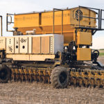 DOT operates as an interchangeable power supply for various implements, sliding into seeder, sprayer and grain cart implement attachments. Instead of needing multiple engines or an independent tractor to power each unit, the DOT can swap out its roles. | Michael Raine photo