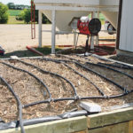 Biobeds can be set up in-ground or above it. A raised biobed at the Canada Saskatchewan Irrigation Diversification Centre at Outlook, Sask., creates a place for microbes in to degrade pesticides and reduce the risk of contaminating water with sprayer waste. | File photo