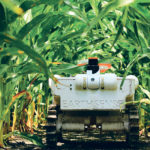 The EarthSenseTerraSentia is a 25 pound autonomous robot that roams cornfields plucking out herbicide resistant weeds. When it hits the market, the device will initially cost less than US$100 per acre per season to operate. The developer says he can make a narrower unit that can work in 15-inch row spacings now used by some Canadian prairie farmers. | EarthSense photo