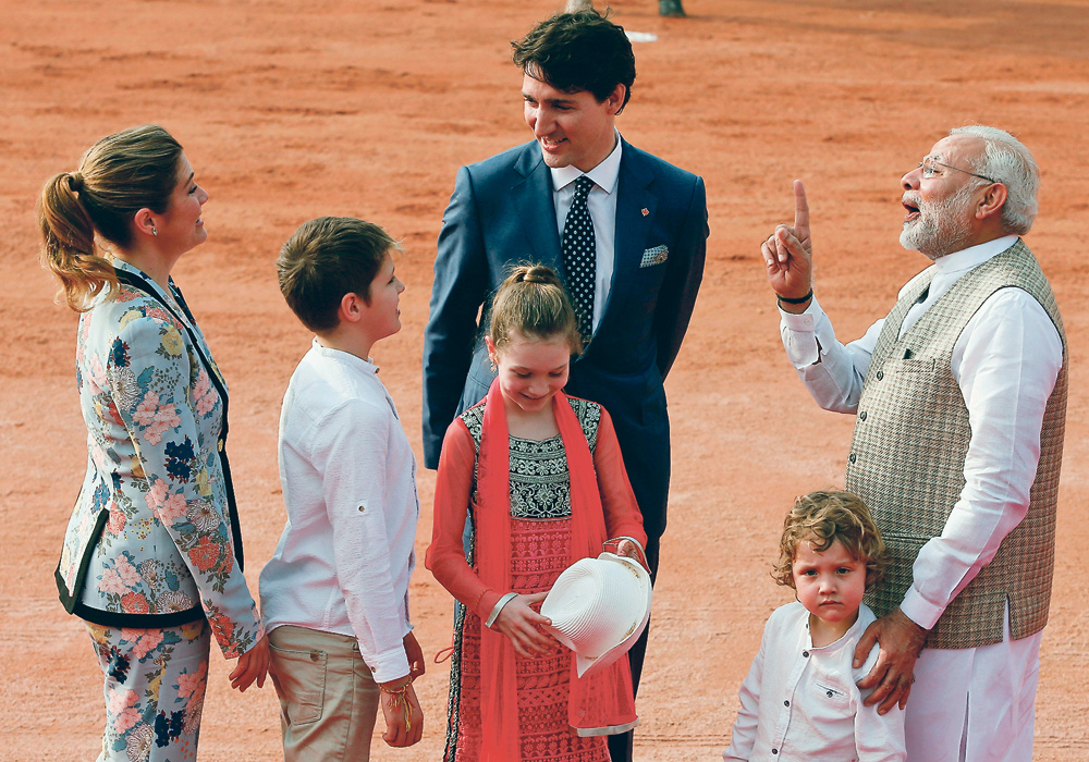 Prime Minister Justin Trudeau, seen here with his family, and Indian Prime Minister Narendra Modi, agreed during a meeting in February to resolve the fumigation issue by the end of the year. That deadline has come and gone.  | REUTERS/Adnan Abidi PHOTO