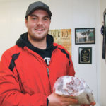 Ian Crosbie of Caronport, Sask., shows a sample of Saskatchewan Snow Beef, a Holstein-Wagyu cross product he is producing and marketing. | Karen Briere photo