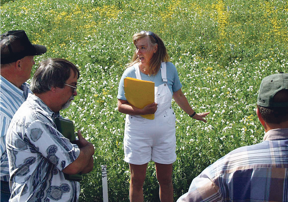 Kirsty Ross, awarded for building the pulse industry, is pictured during a field day in the mid-1990s.  | Photo supplied by Kirsty Ross