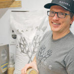 Matt Enns of Maker’s Malt in Rosthern, Sask., inspects a recent batch of malt made with Bow barley. Maker’s has been malting locally grown barley since early 2018. Finished malt is sold to craft brewers, mostly in Saskatchewan. | Brian Cross photo