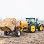 Elmer’s new Ravage Bale Processor holds three square bales at once, reducing the need to stop to load more bales. | Ron Lyseng photo