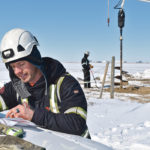 Eric Cowger of AltaLink conducts a safety briefing for visitors to the hawk nest installation site. | Barb Glen photo