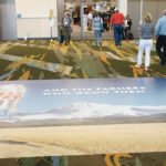 Farmers attending the recent 2019 Commodity Classic, including U.S. Agriculture Secretary Sonny Perdue, vowed to stop drinking Bud Light beer after it aired a Super Bowl commercial that said it is no longer using corn syrup in its beer. That prompted Coors Light to take out a carpet advertisement in front of the trade show doors at the Commodity Classic saying, “we’re proud of our ingredients and the farmers who grow them.” | Sean Pratt photo