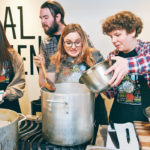 Chef Scott Dicks watches the action as Grade 11 student Nikki Boot, left, from Kenaston, Sask., Grade 11 student Hanna Gust from Davidson, Sask., and Grade 10 student Isaiah Shurmer from Centennial Collegiate in Saskatoon prepare food during a Farm to Fork event in Saskatoon March 7. | William DeKay photo