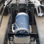 Steve Heckeroth has spent 25 years installing electric motors in cars, trucks, race cars and tractors. The fact that an electric motor has only one moving part makes it energy efficient and low-maintenance according to the inventor. This 40 h.p. motor is being installed in a Ford New Holland look alike tractor from India. | Solectrac photo