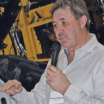 Independent combine consultant Murray Skayman says the combines bought on the Canadian Prairies are designed and built for corn and soybeans. When they arrive on the Prairies, there are often a number of small modifications that need to be done, especially for work in canola. | Ron Lyseng photo