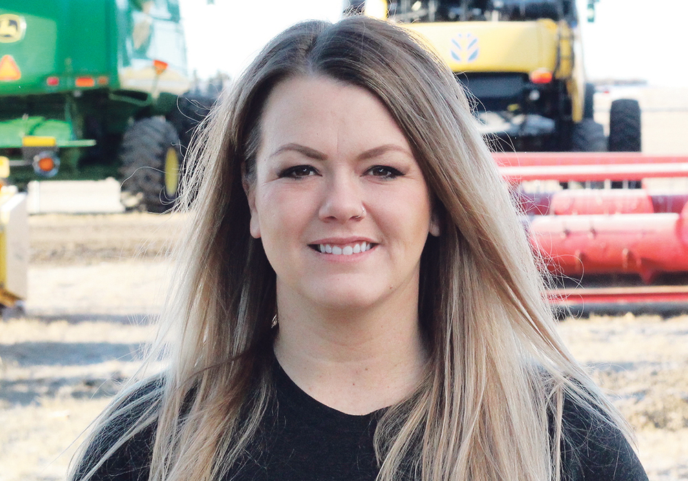 Sheri Dale of Combine World in Allan, Sask., told the Combine College about numerous ways a farmer can upgrade an older combine. For example, she sells a Farm TRX monitor system that tracks yields, builds reports and maps, and costs less than $2,000.  |  Ron Lyseng photo