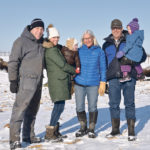 The Van Haren family, including Roger, left, Katelyn holding George, Judy, and Erwin holding Brianna, raise bison because of the animals’ self-sufficiency. | Maria Johnson photo