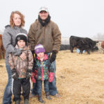 Ashley and Ryan Kattler, with son Flint and daughter Summer, farm south of Indian Head, Sask. | Karen Briere photo