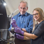 Jack Gray and Rachel Parkinson study locusts in their lab at the University of Saskatchewan. | U of S photo
