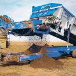 Rather than lifting the belt or inside systems of the cart, the whole cart is raised for emptying. Optional soil removal can take tonnes of dirt from a single load of potatoes or beets, improving storability and reducing handling prior to barn storage. | STP Manufacturing photo