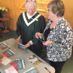 Supporting the Canadian Foodgrains Bank isn’t restricted to farm country. At this Winnipeg church, volunteers collect signatures calling on the government to increase its support. | Ed White photo