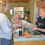 Pendryl General Store co-owner Kim Butters visits with customer Dallas Duffy of Buck Lake, Alta. | Maria Johnson photo