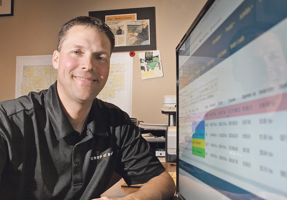 Airdrie, Alta., farmer Larry Woolliams uses whole-farm enterprise software, Crop Boss, to analyze the effectiveness of a significant investment in new field technology this year. “It looks like (the investment) will make its own payments. We like that,” he said.  |  Michael Raine photo