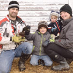 Stephen, left, Hayes, Kett and Nicole Poburan at home on their farm. | Maria Johnson photo